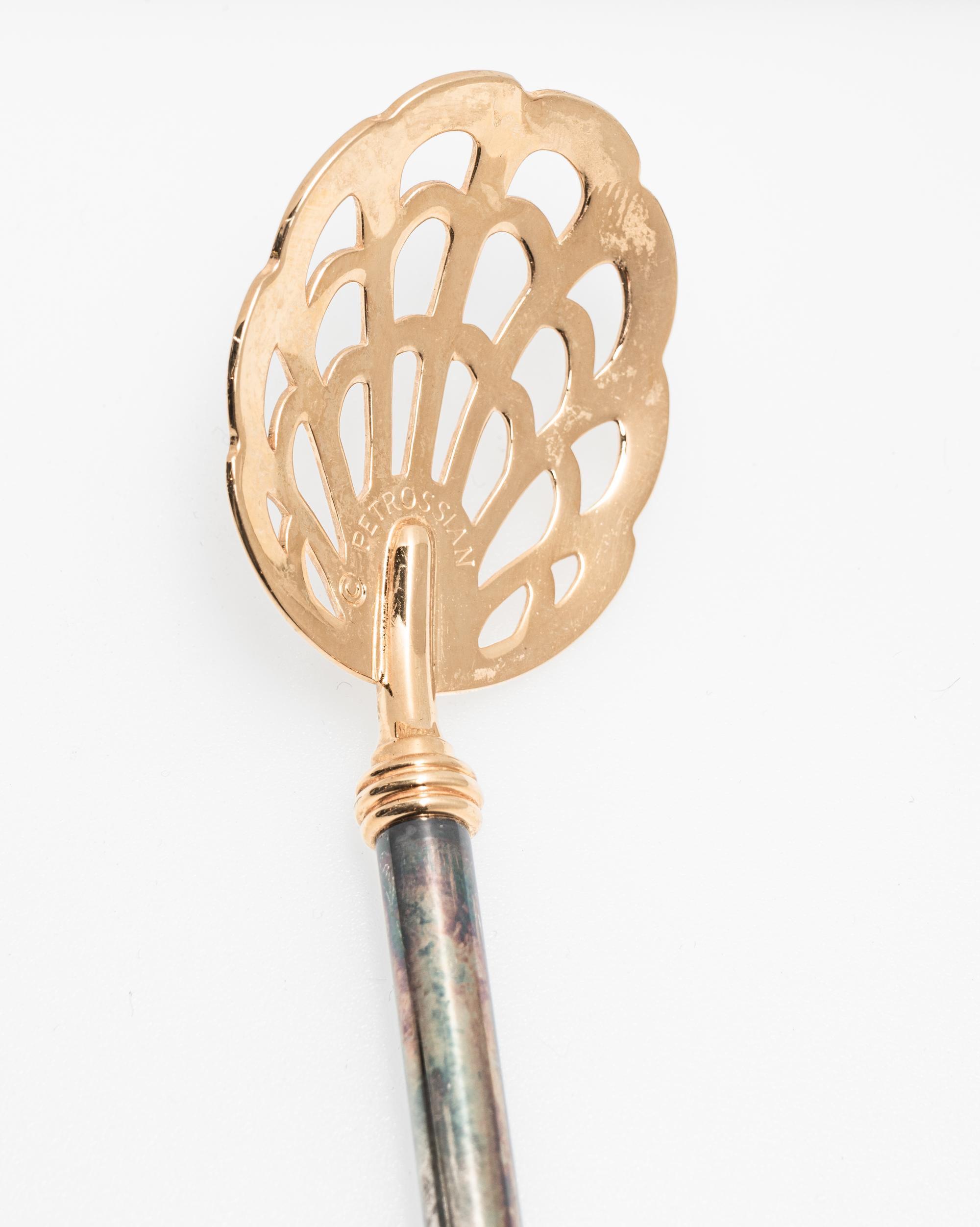 A Group of Petrossian Gold- and Silver-Plate Pierced Caviar Spoons