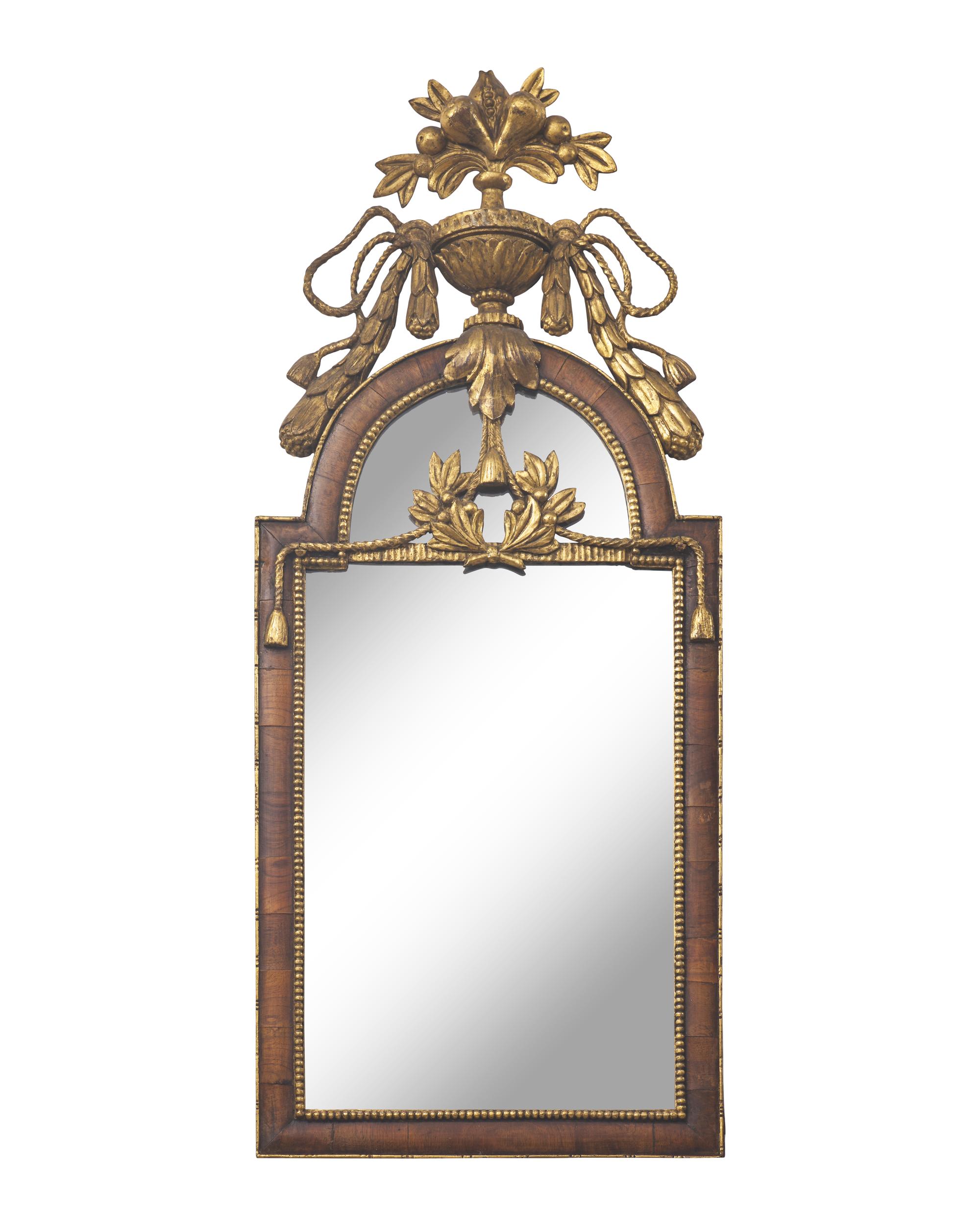 A Spanish "Bilbao" Walnut-Veneered and Parcel-Gilt Mirror For the American Market