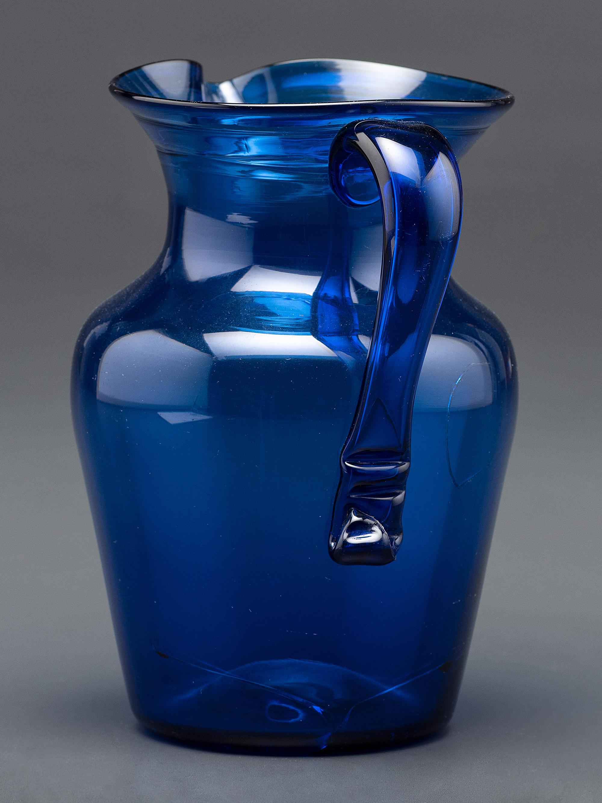 A Midwestern Glass Pitcher in Blue