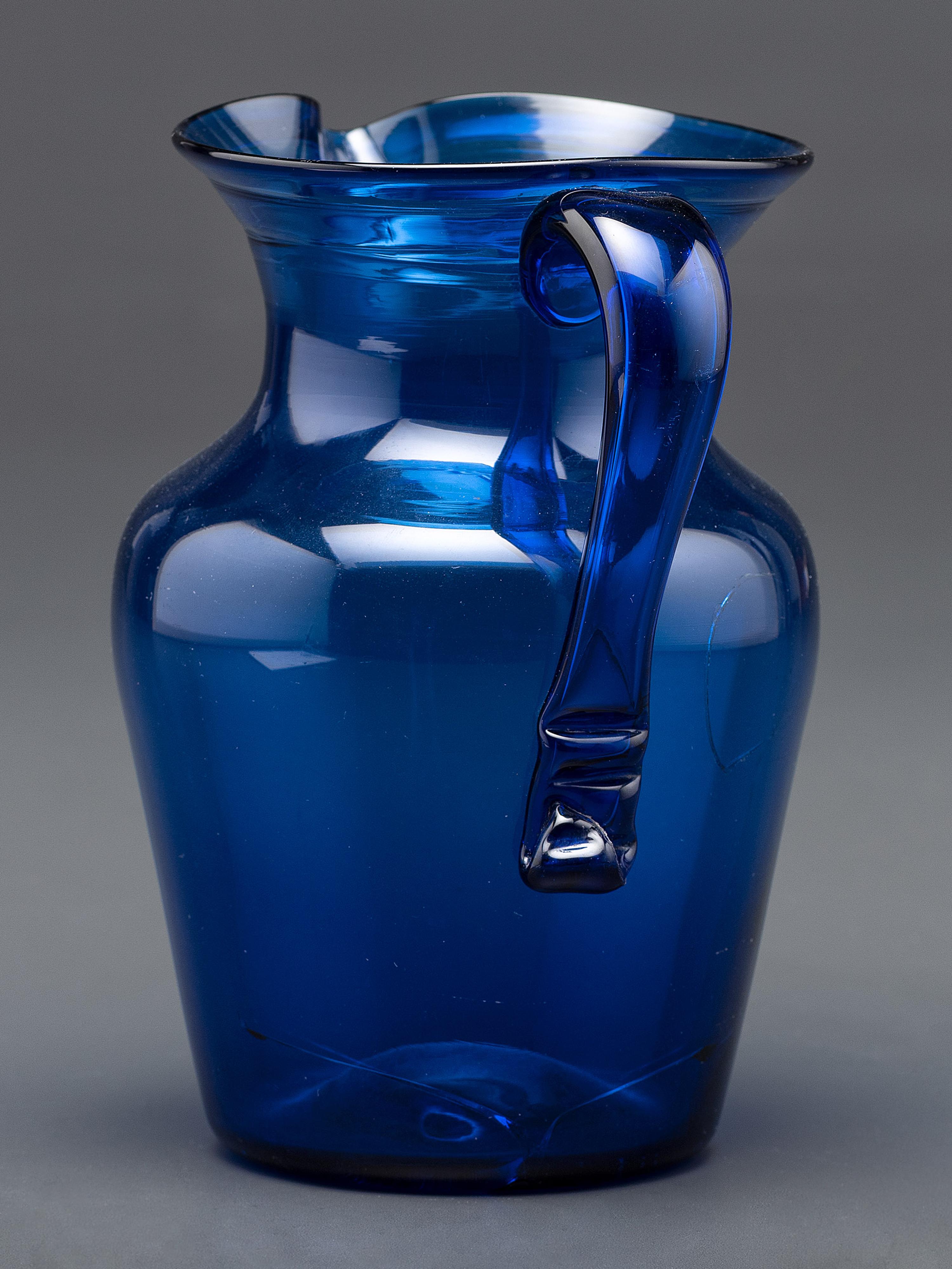 A Midwestern Glass Pitcher in Blue