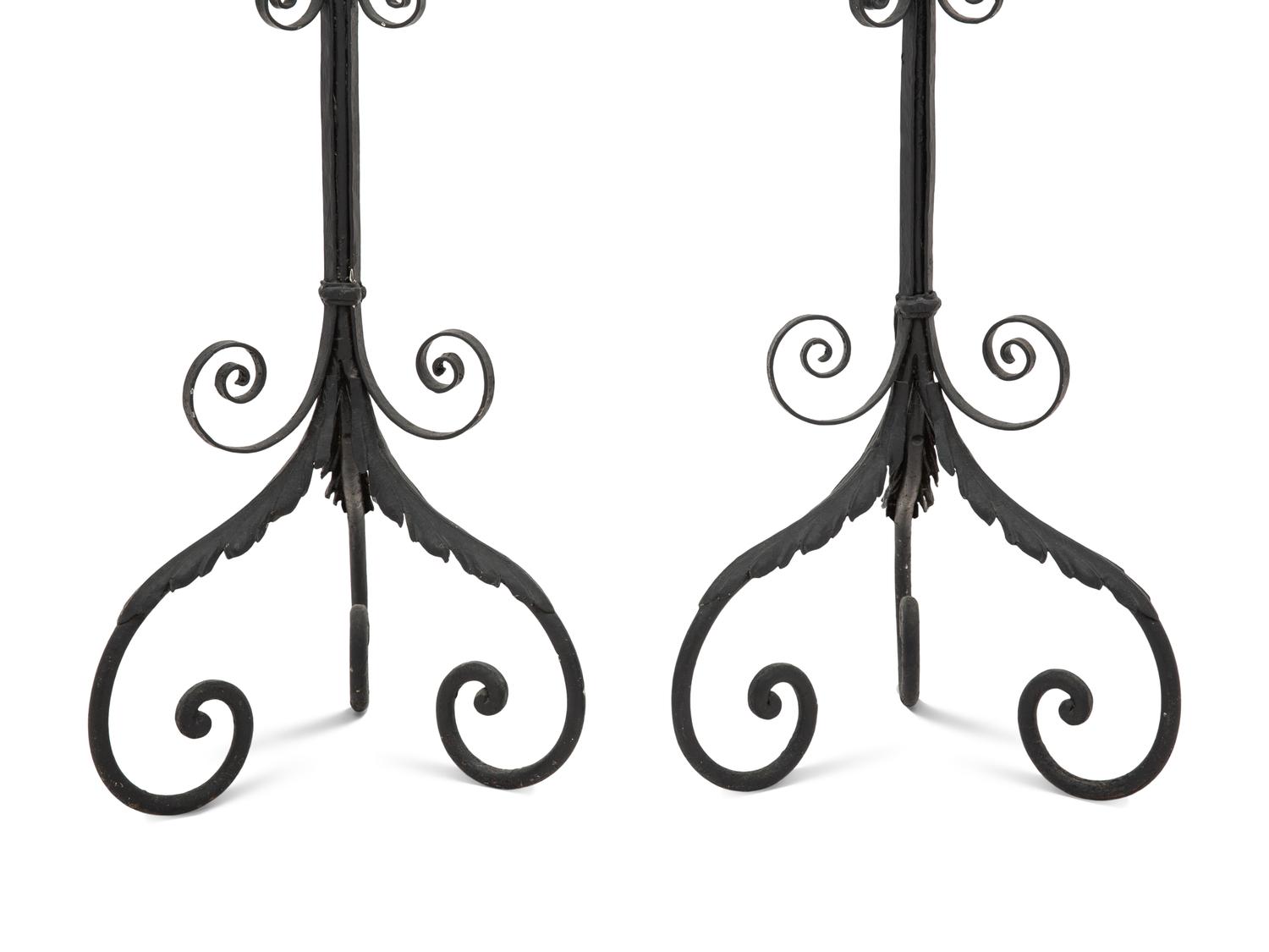 A Pair of Spanish Colonial Style Wrought Iron Floor Lanterns