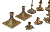 A Collection of Brass Candlesticks