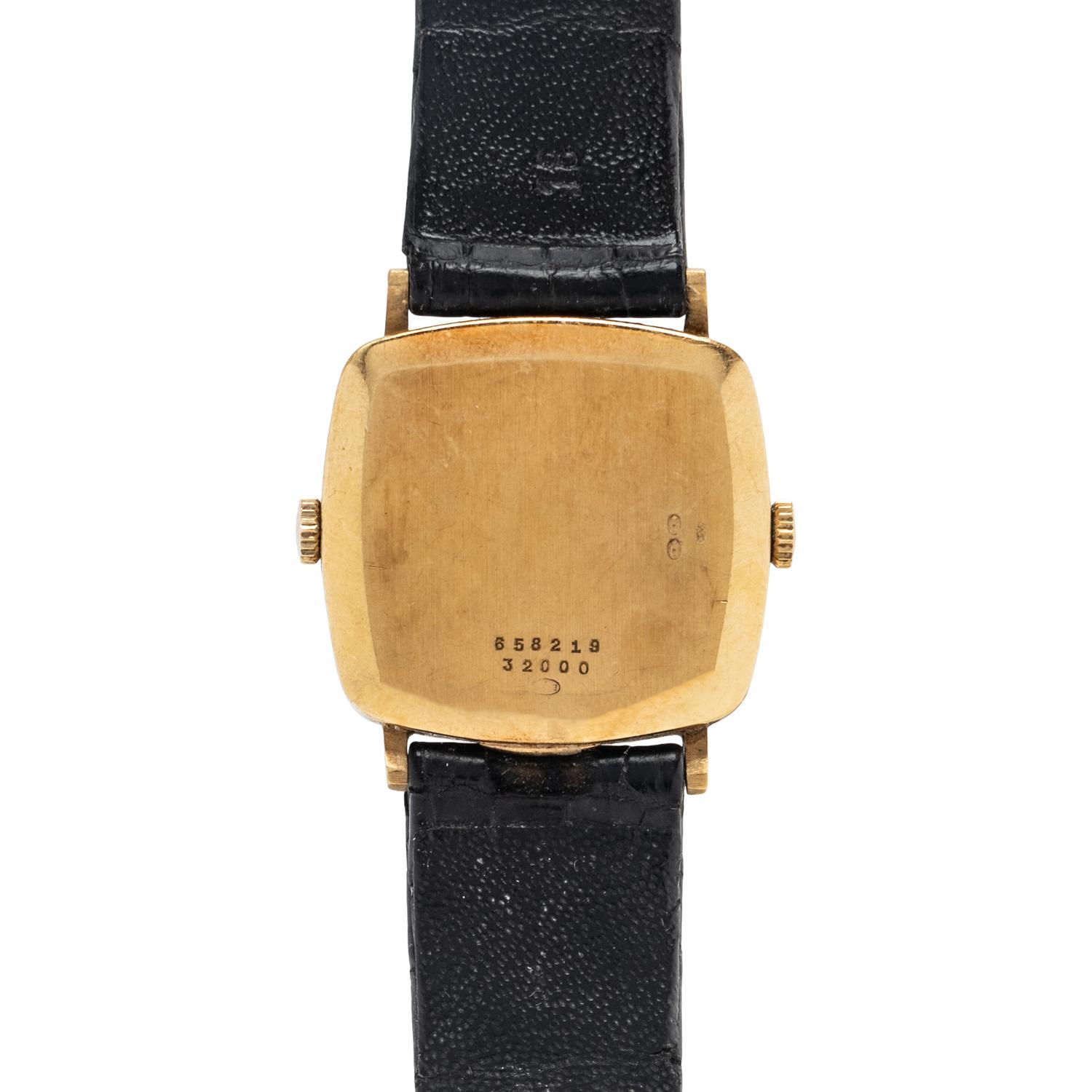BAUME & MERCIER, YELLOW GOLD DUAL TIME ZONE WATCH