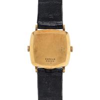 BAUME & MERCIER, YELLOW GOLD DUAL TIME ZONE WATCH
