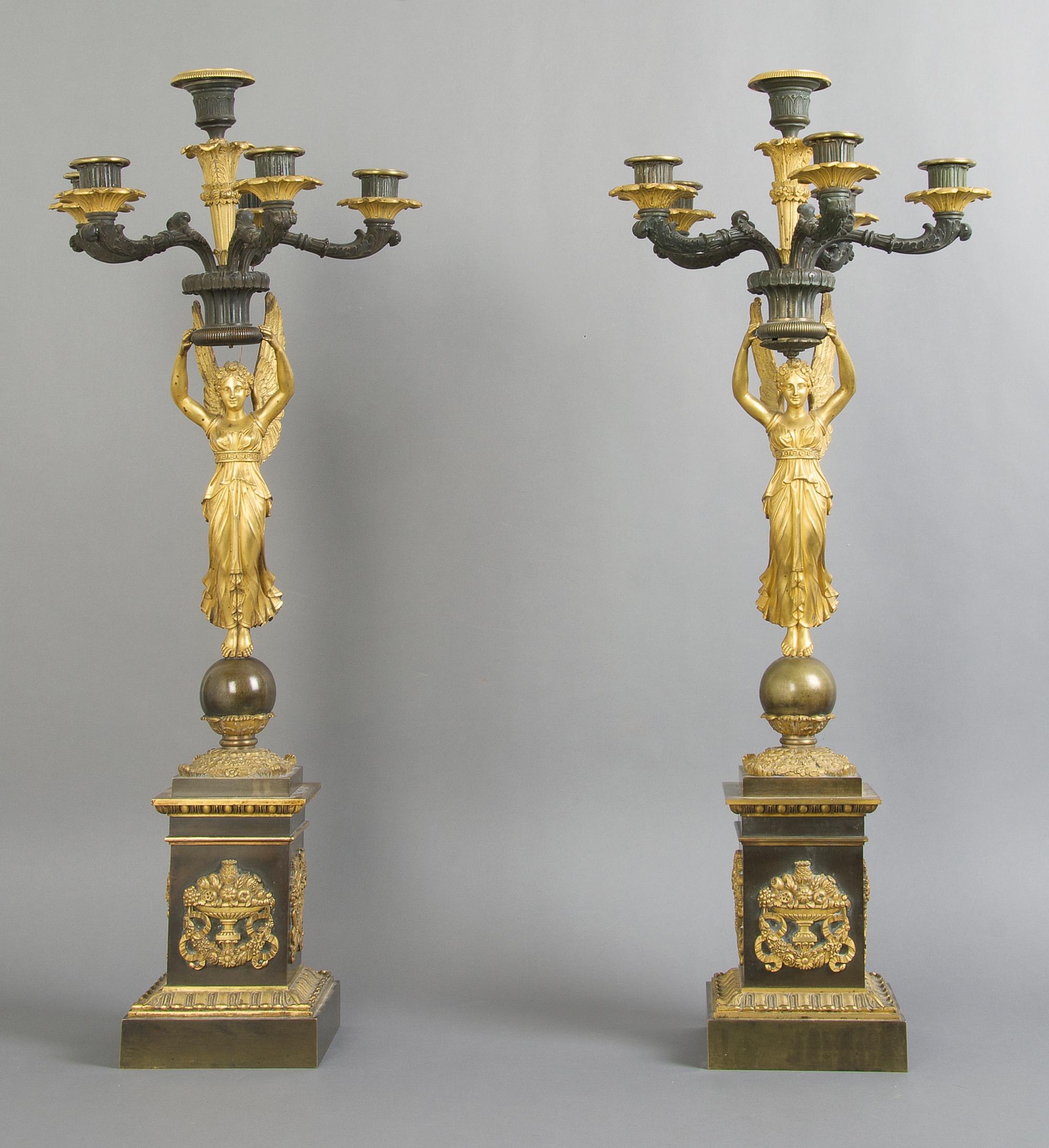A Pair of Empire Gilt and Patinated Bronze Six-Light Candelabra, Height 29 inches.