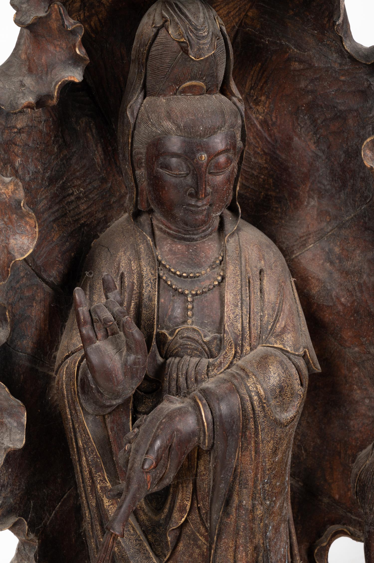 A Monumental Chinese Parcel Gilt Carved Harwood Figure of Guanyin