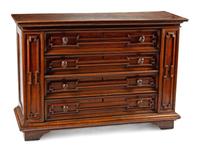 An Italian Baroque Walnut Chest of Drawers