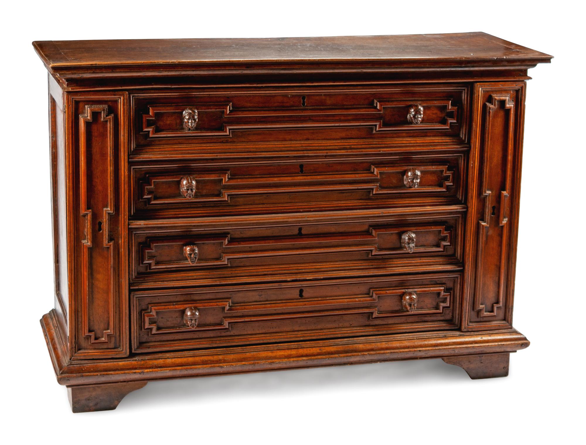 An Italian Baroque Walnut Chest of Drawers
