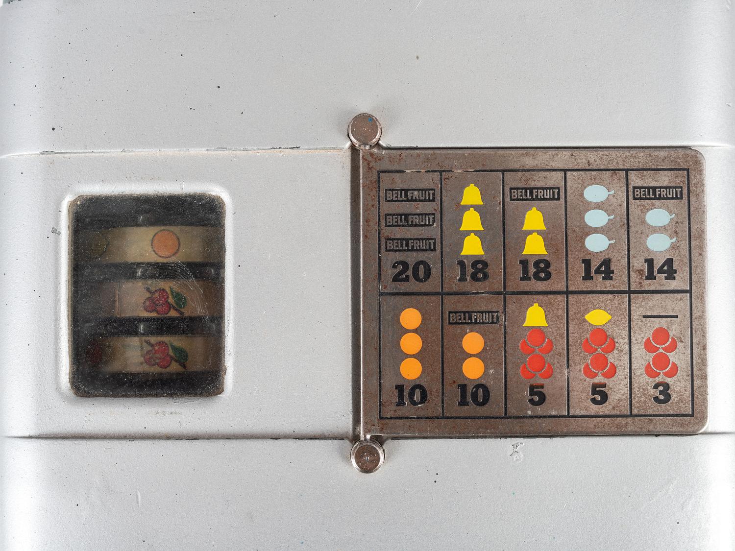 A Mills Novelty Co. 5 Cent Miniature Three Reel Slot Machine