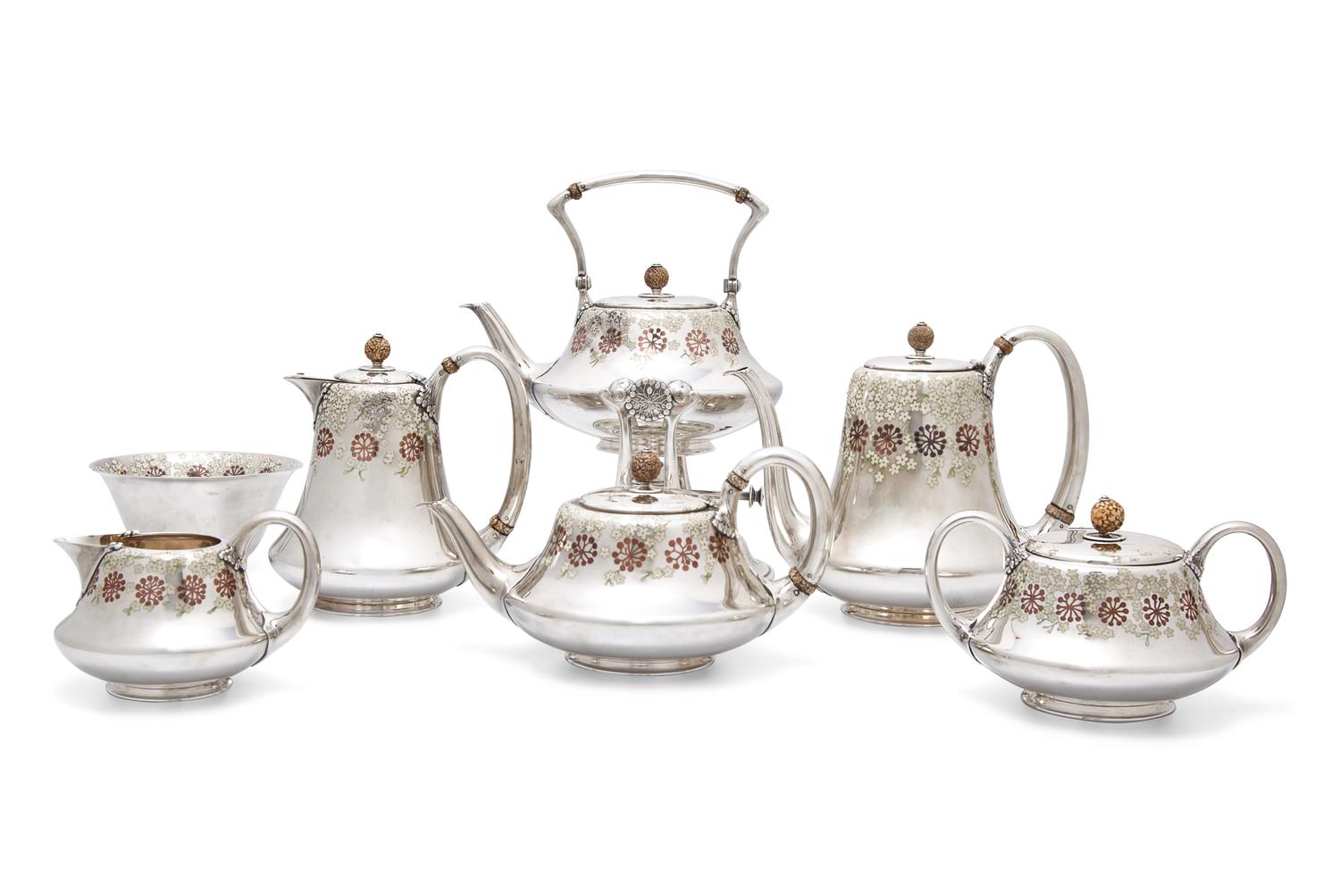 A Tiffany & Co. Seven-Piece Sterling Silver, Copper and Enameled Tea and Coffee Service