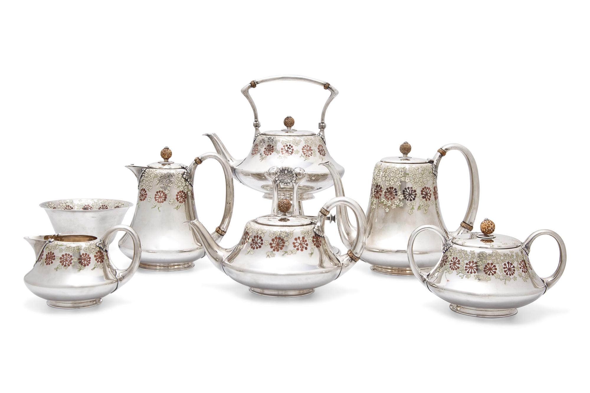 A Tiffany & Co. Seven-Piece Sterling Silver, Copper and Enameled Tea and Coffee Service