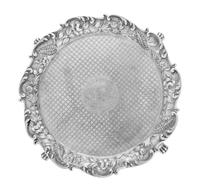 An American Silver Salver, S. Kirk & Son, Baltimore, MD, the rim formed of S-scrolls enclosing the repousse floral and foliate border,