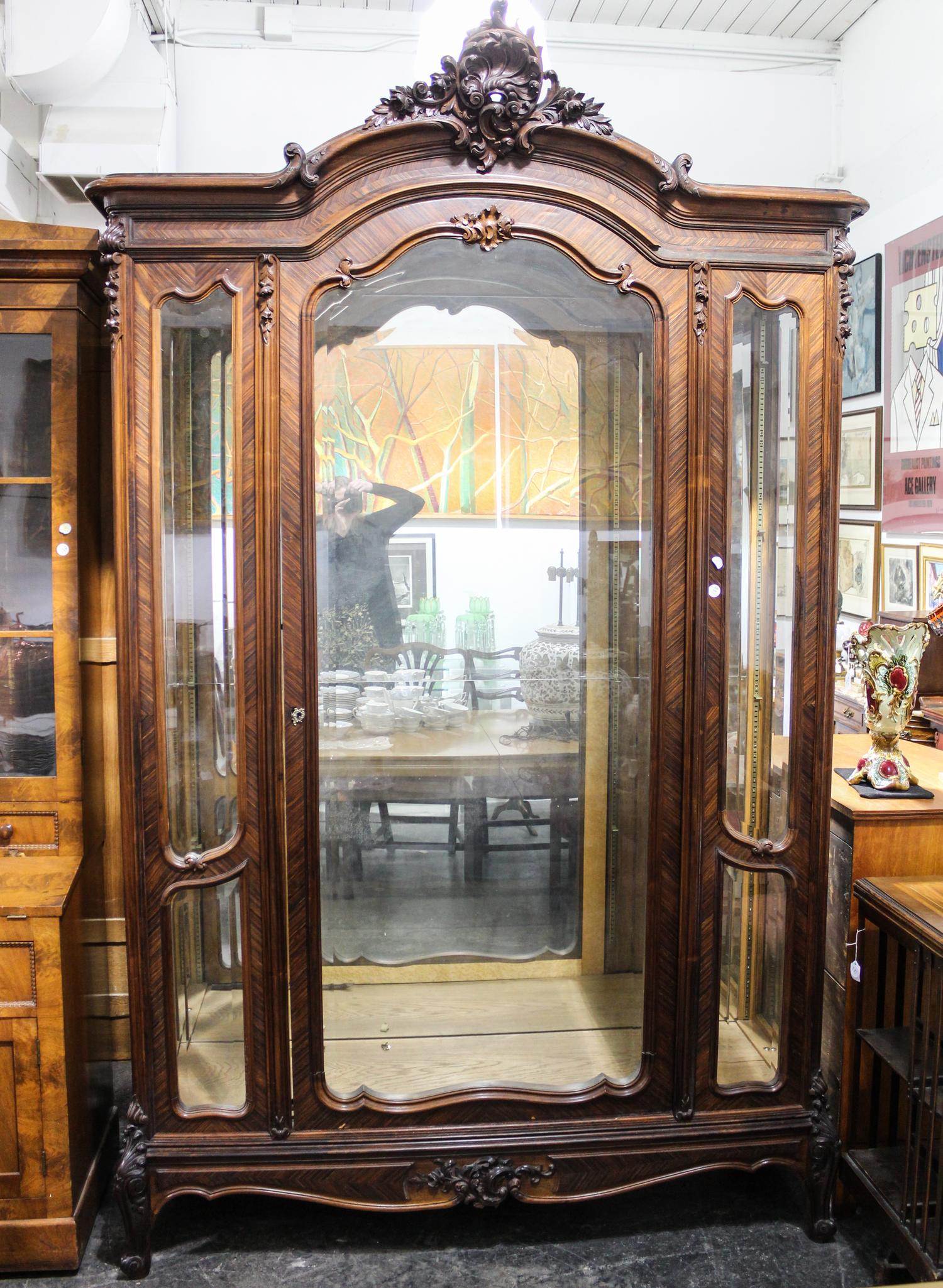 A Louis XV Style Walnut Vitrine Height 102 1/2 x width 62 x depth 23 3/4 inches. — EARLY 20TH CENTURY