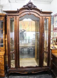A Louis XV Style Walnut Vitrine Height 102 1/2 x width 62 x depth 23 3/4 inches. — EARLY 20TH CENTURY