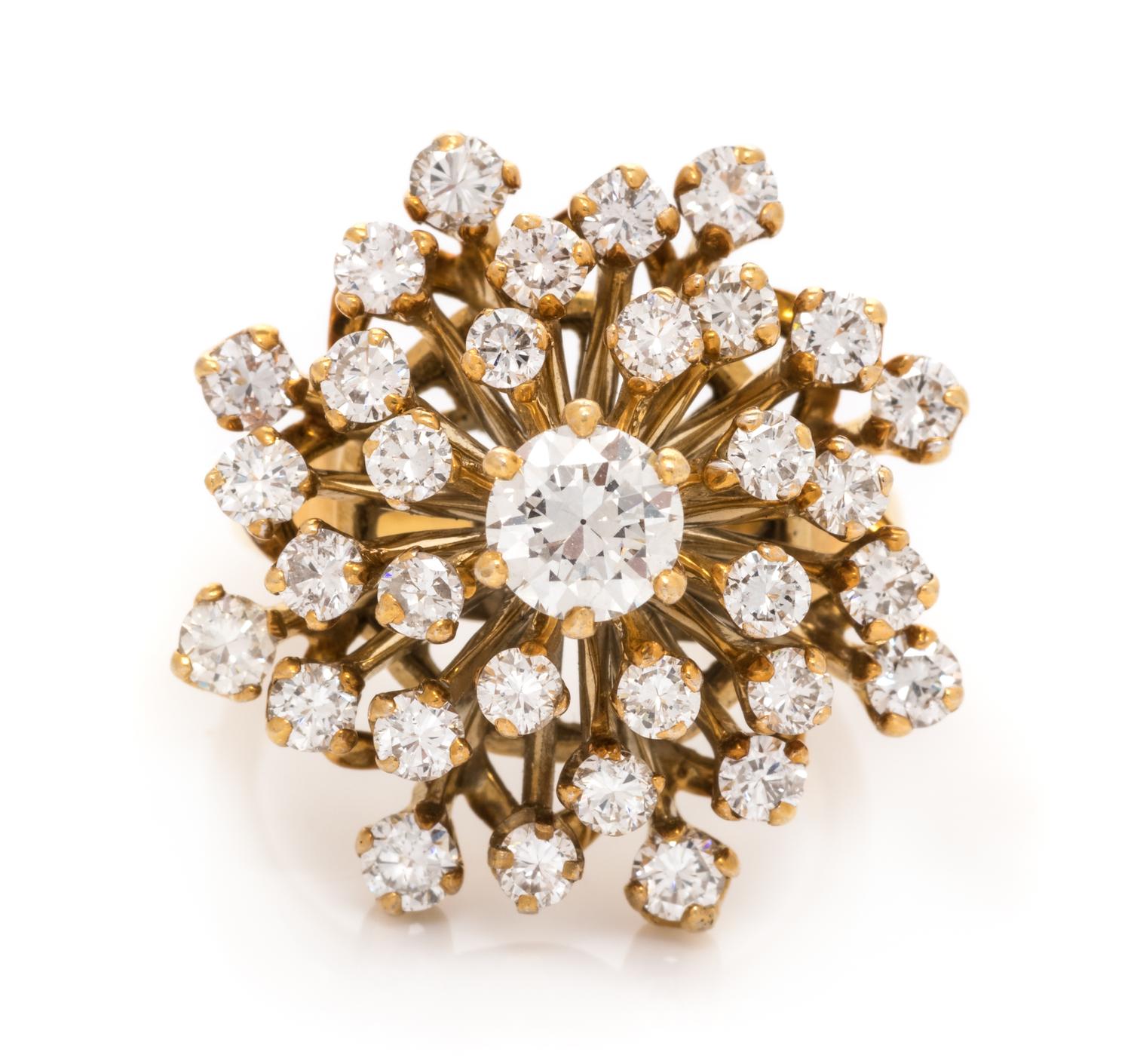 A 14 Karat Yellow Gold and Diamond Cluster Ring,