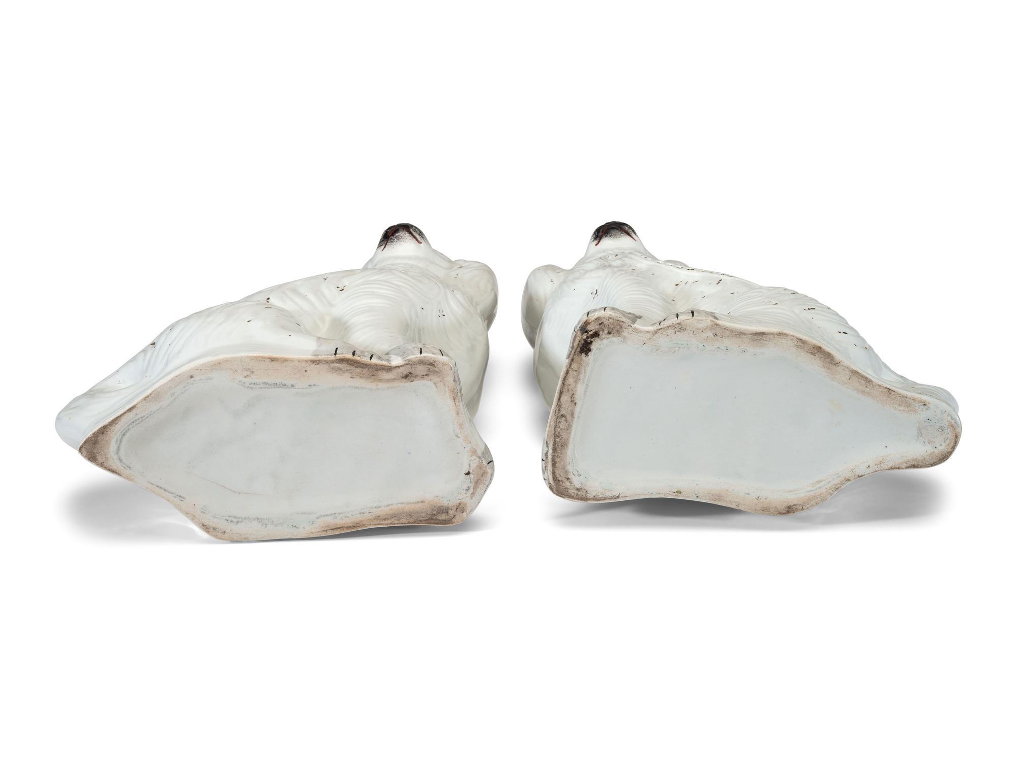 Four Staffordshire Spaniel Figures
