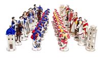 A Rudolf Kammer Porcelain Chess Set Height of tallest 6 3/4 inches. — 20TH CENTURY
