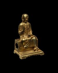 A Chinese Gilt Bronze Figure of a Seated Monk