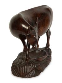 A Carved Wood Bull Sculpture