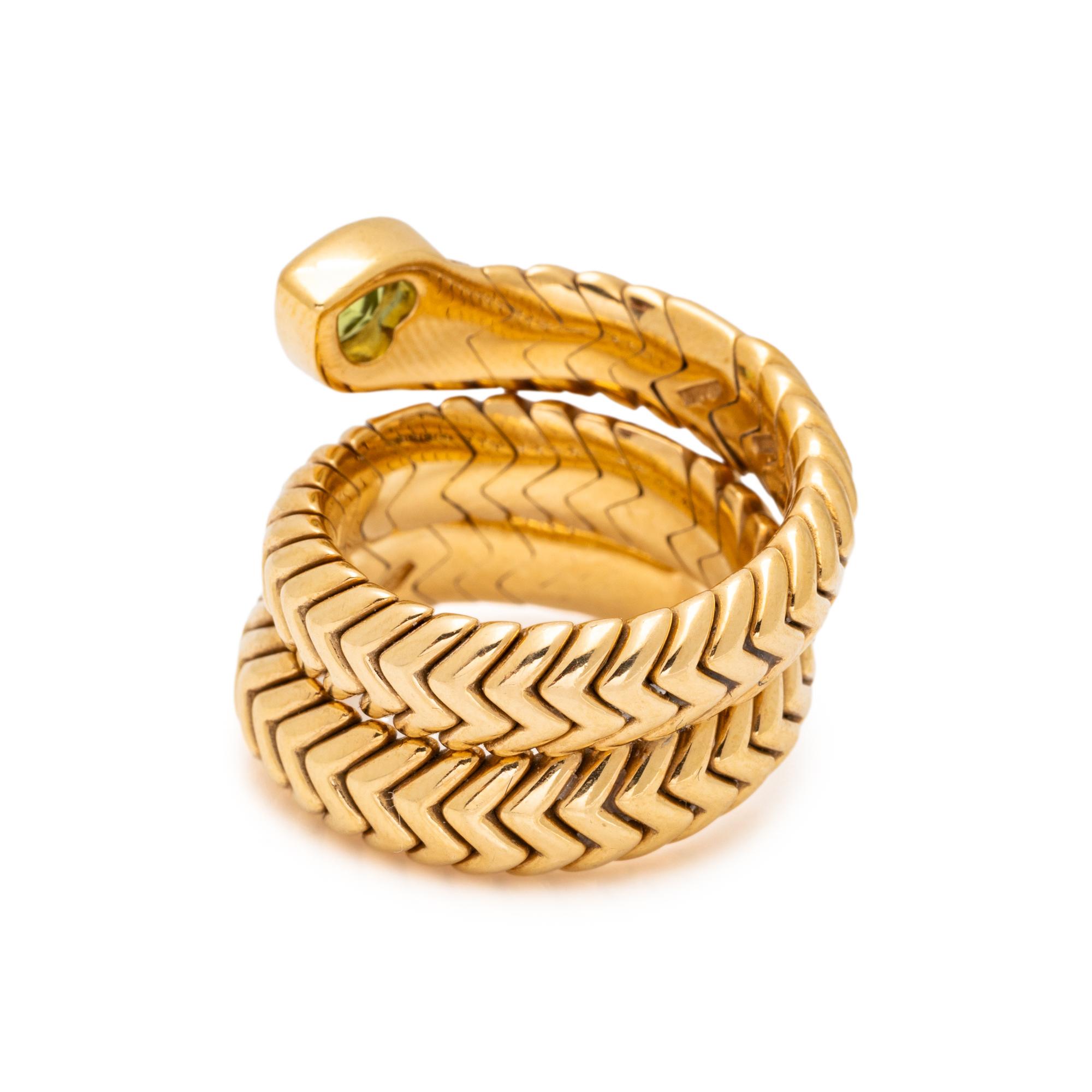 BULGARI, YELLOW GOLD, DIAMOND, AND PERIDOT 'SPIGA' RING