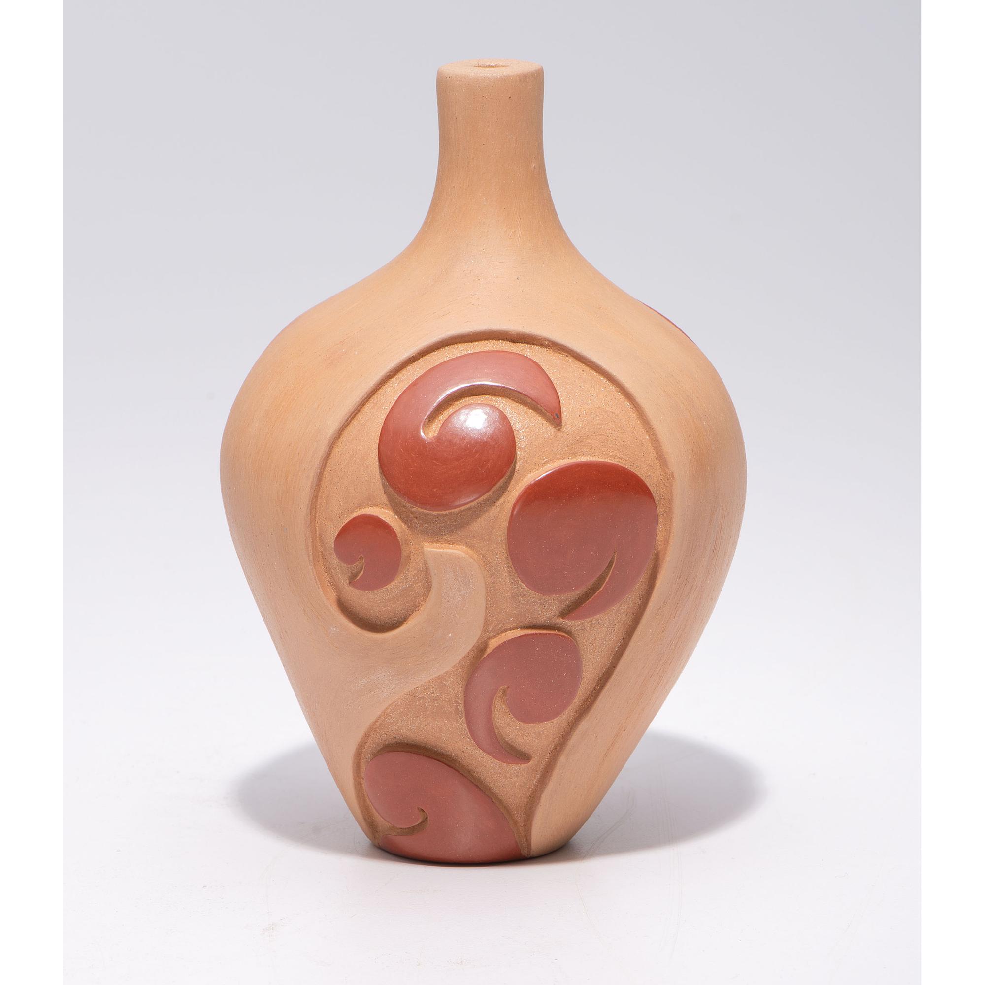 Carved Micaceous Redware Jar, with Avanyu and Raindrops