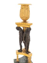 A Pair of French Egyptian Revival Bronze and Marble Candlesticks