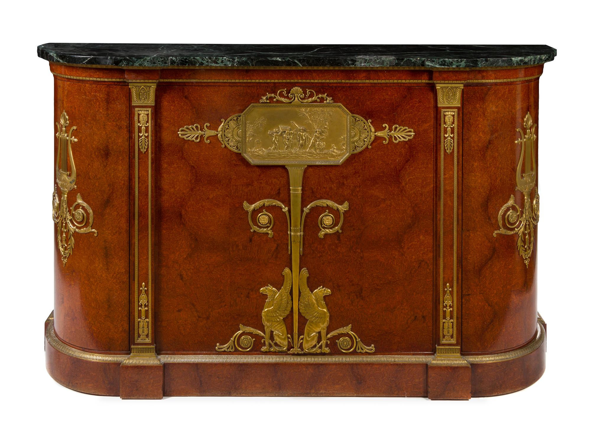 An Empire Style Gilt Bronze Mounted Amboyna Cabinet Height 47 3/8 x width 78 3/4 x depth 28 1/4 inches. — MAXIME SECRETANT, 1923