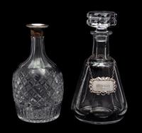Two Crystal Decanters Height of taller 9 1/2 inches. — 20TH CENTURY