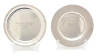 Two American Silver Trophy Plates, Cartier, New York, NY and International, the Cartier plat having a gadrooned border and inscribed In