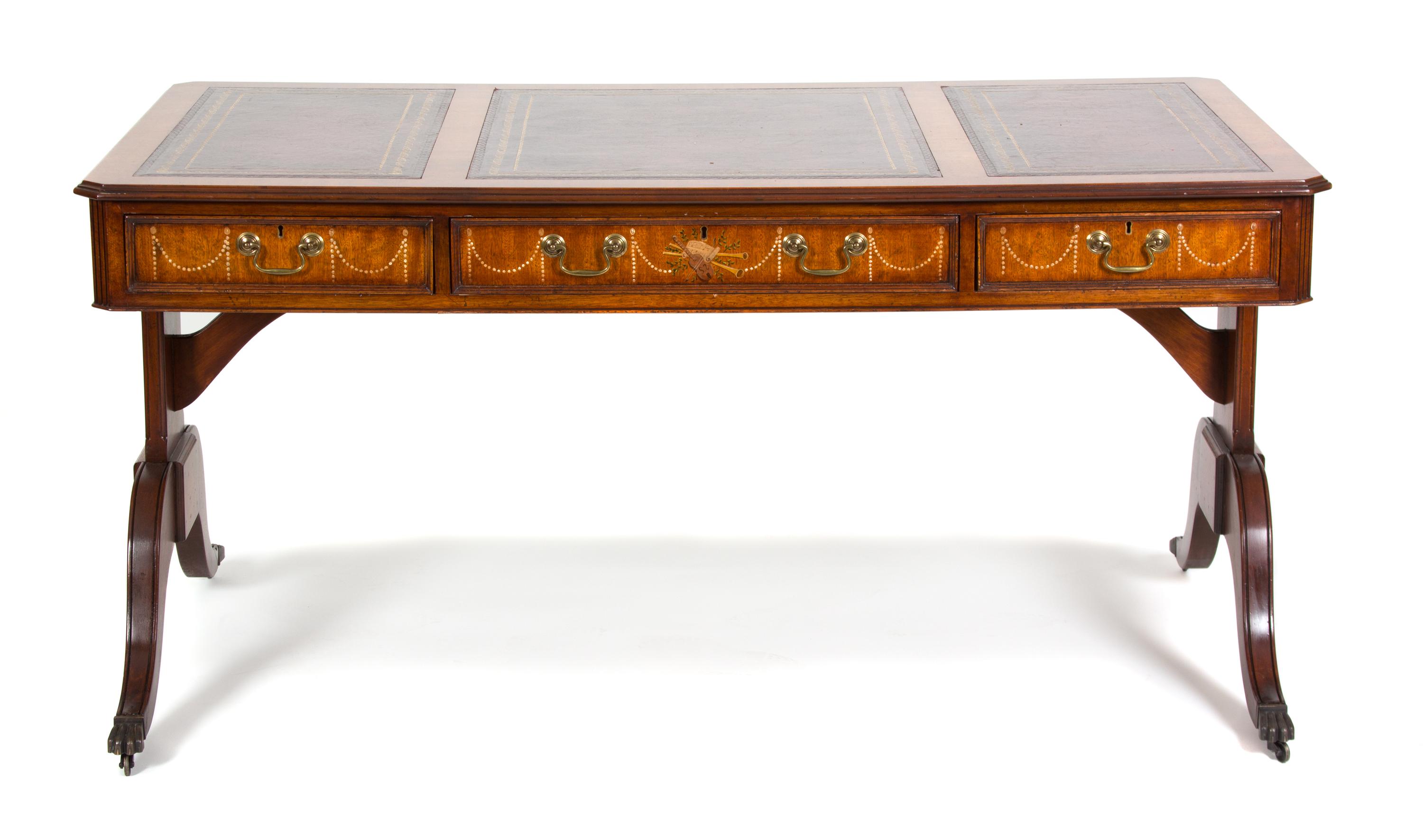 An Edwardian Style Mahogany Writing Desk Height 30 1/2 x width 61 1/2 x depth 34 inches. — 20TH CENTURY