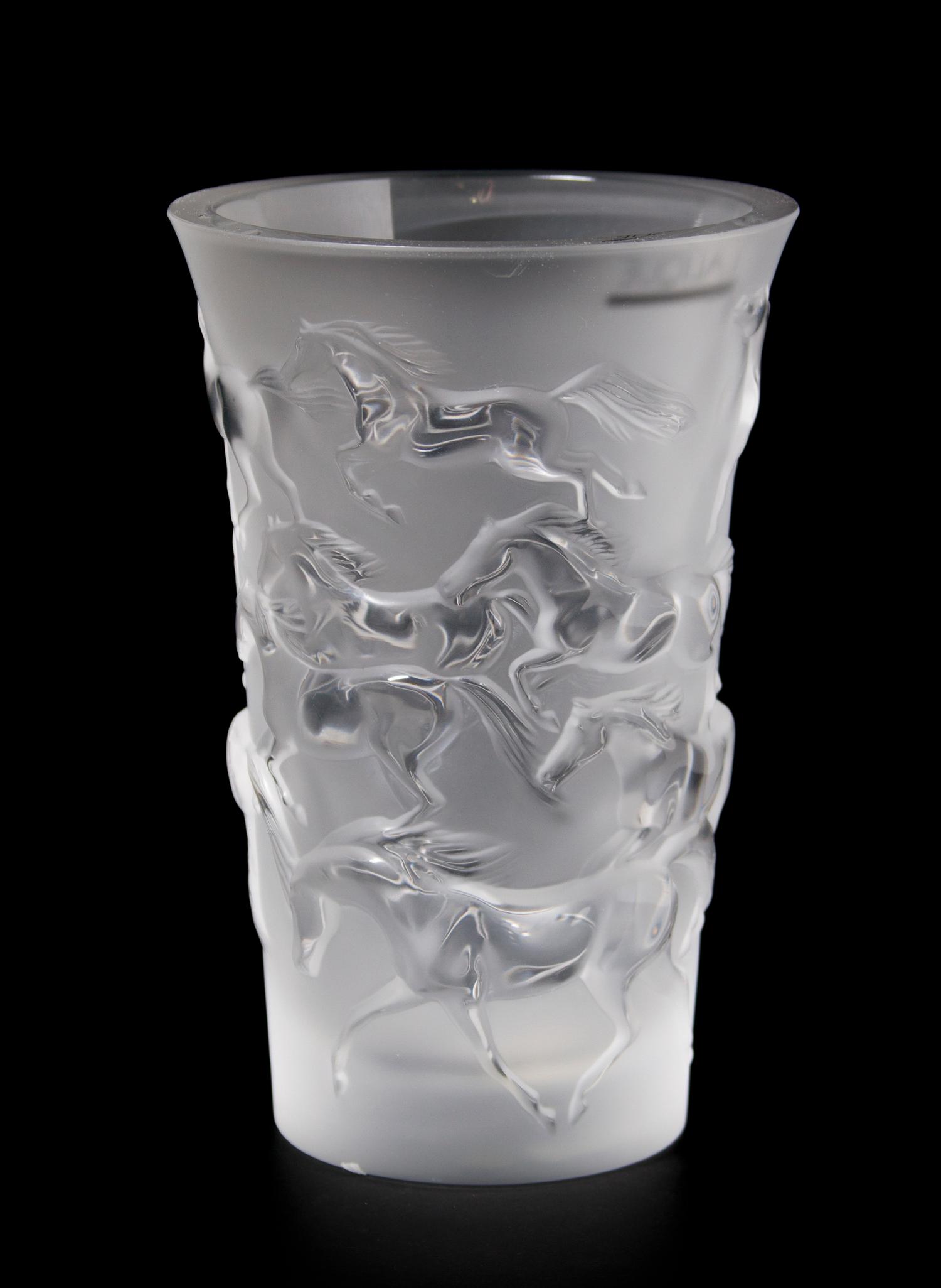 A Lalique Molded and Frosted Glass Vase, Height 7 inches.