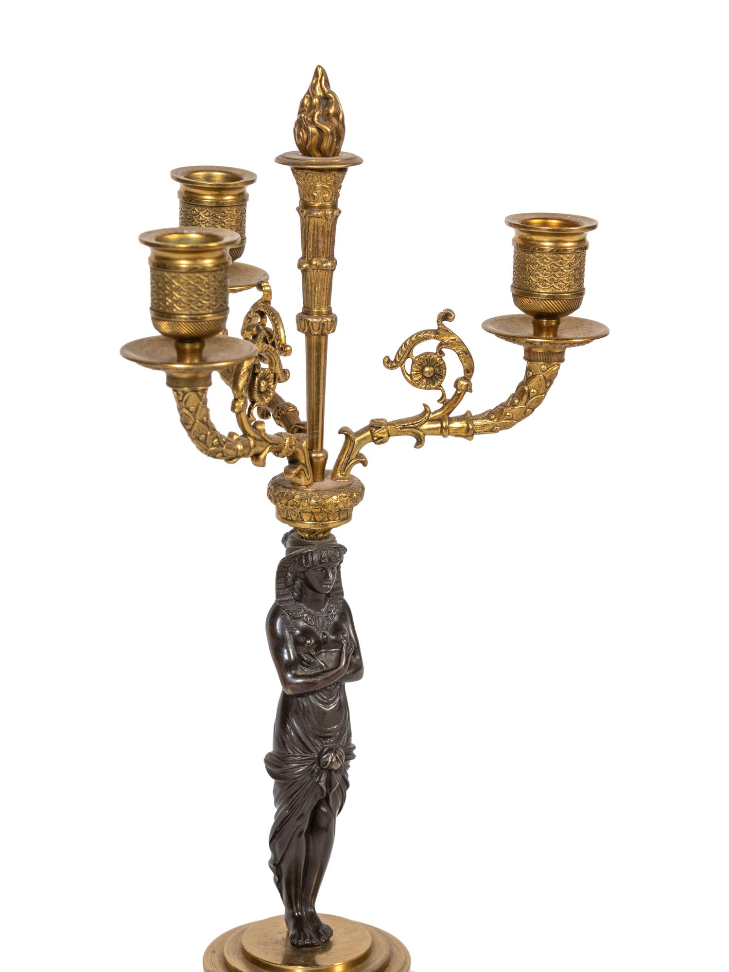 A Pair of Empire Style Gilt and Patinated Bronze and Marble Candelabra