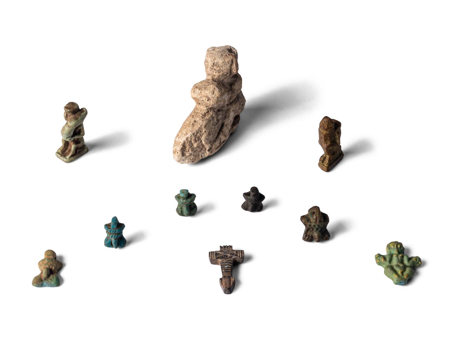 Ten Egyptian Faience Erotic Amulets