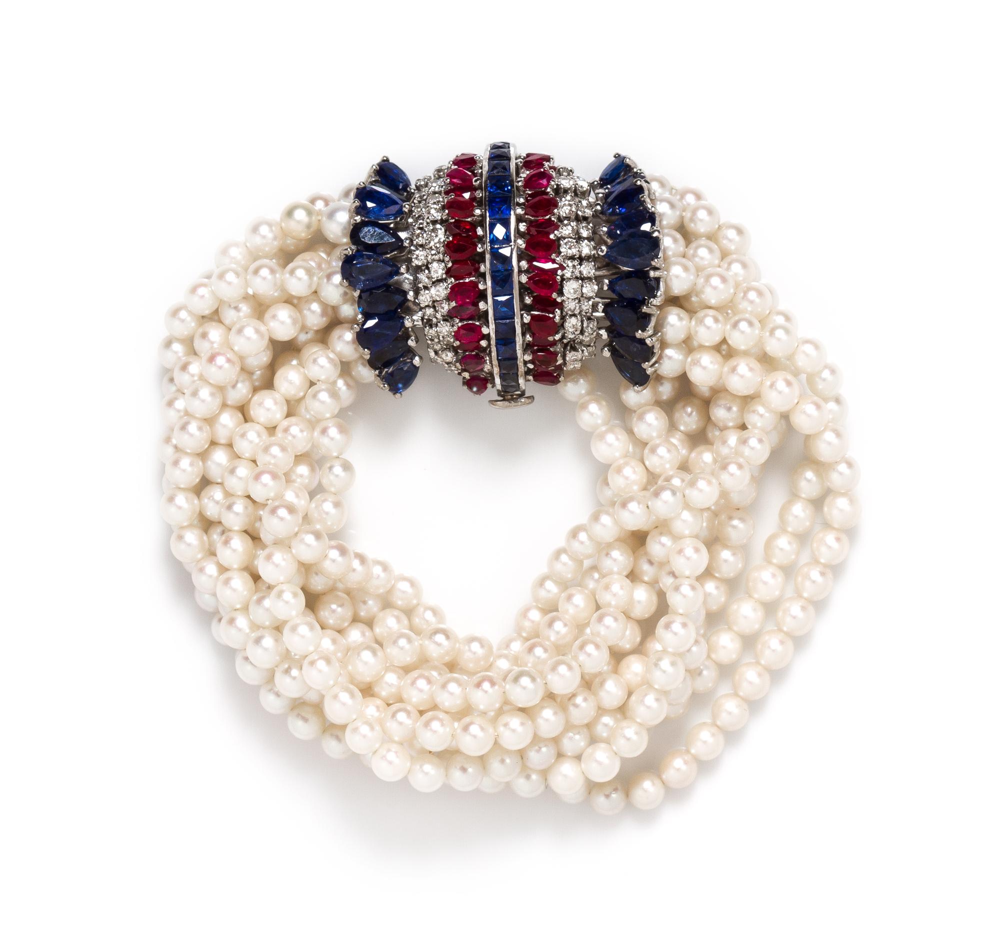 A Retro Platinum, Sapphire, Ruby, Diamond and Cultured Pearl Multi Strand Bracelet, 43.40 dwts.