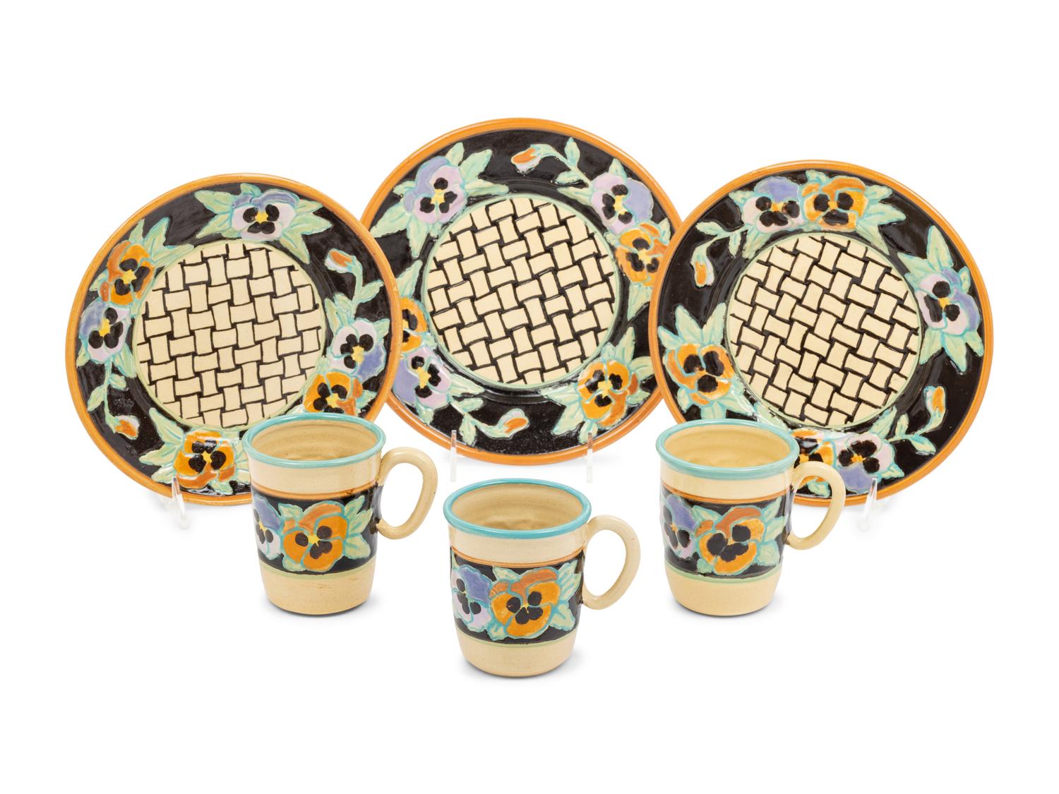 A Set of Dan Bleier Studio Ceramic Plates and Mugs