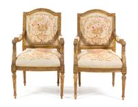 A Pair of Louis XVI Style Giltwood Fauteuils Height 41 inches. — 20TH CENTURY