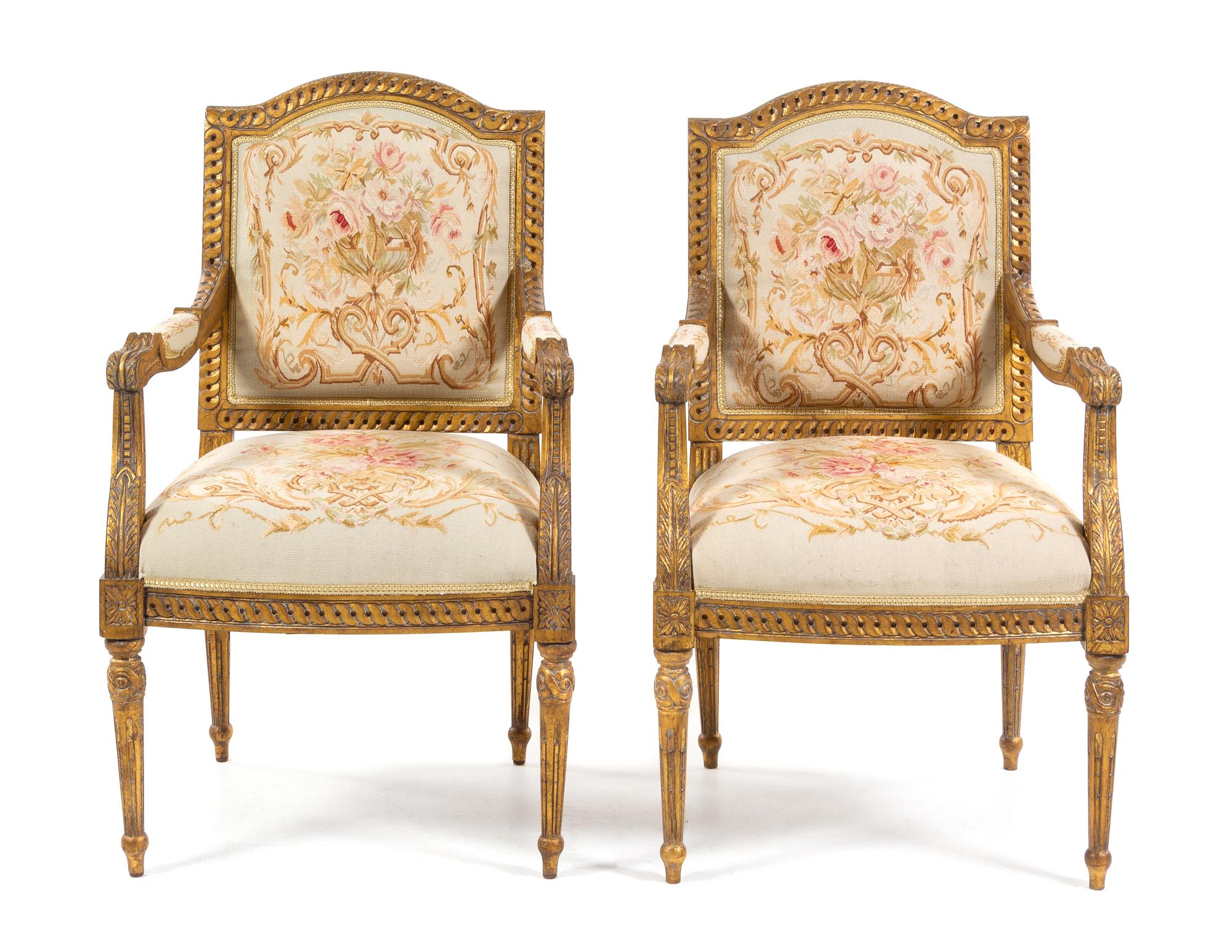 A Pair of Louis XVI Style Giltwood Fauteuils Height 41 inches. — 20TH CENTURY