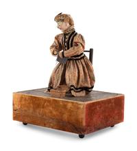 A Knitter Automaton on Base
