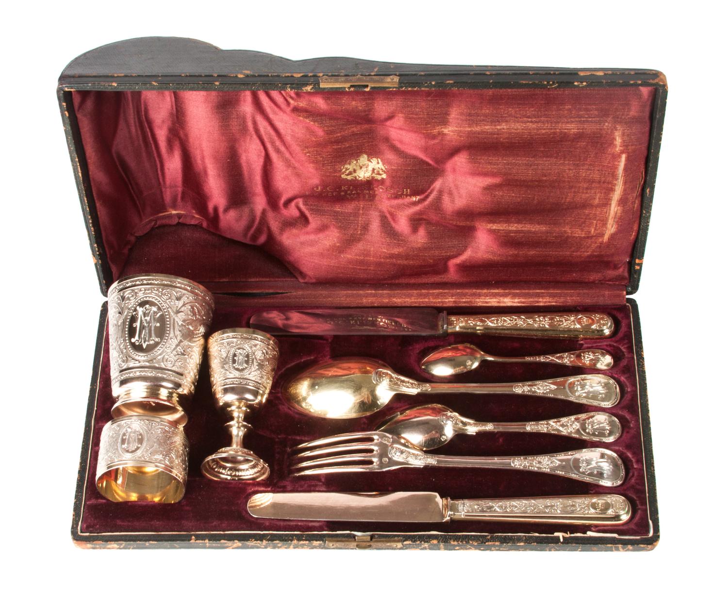 An Austrian Silver Travel Place Setting, J.C. Klinkosch, Vienna, comprising a drinking cup, eggcup, napkin ring, set of flatware, and c