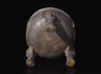 A large Chinese patinated bronze archaistic tripod censer, Ding, and wood cover, The Bronze 17th/18th Century or Earlier 清 青銅鼎式爐