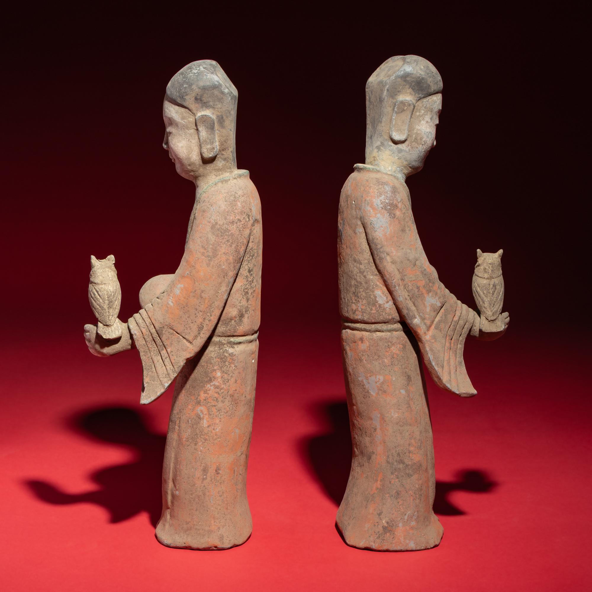 A Pair of Chinese Painted Grey Pottery Ladies with Owls, Han Dynasty — 漢 灰陶彩繪持鷹女俑一對