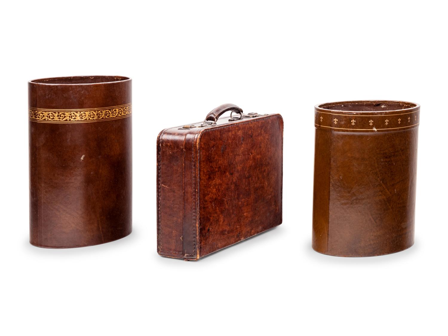 A Vintage Leather Case and Two Leather Wastebaskets