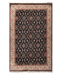 An Indo-Kashan Wool Rug