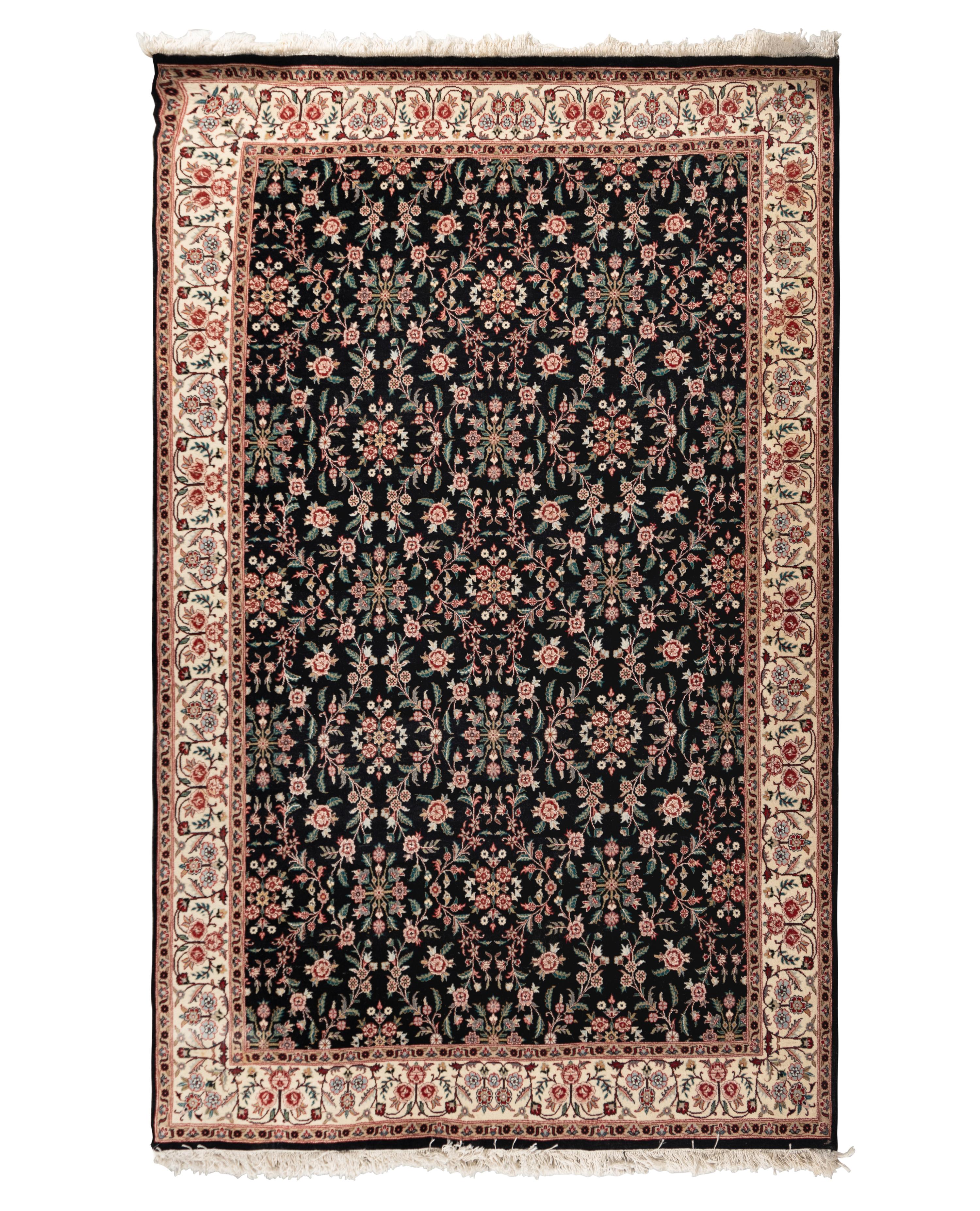 An Indo-Kashan Wool Rug