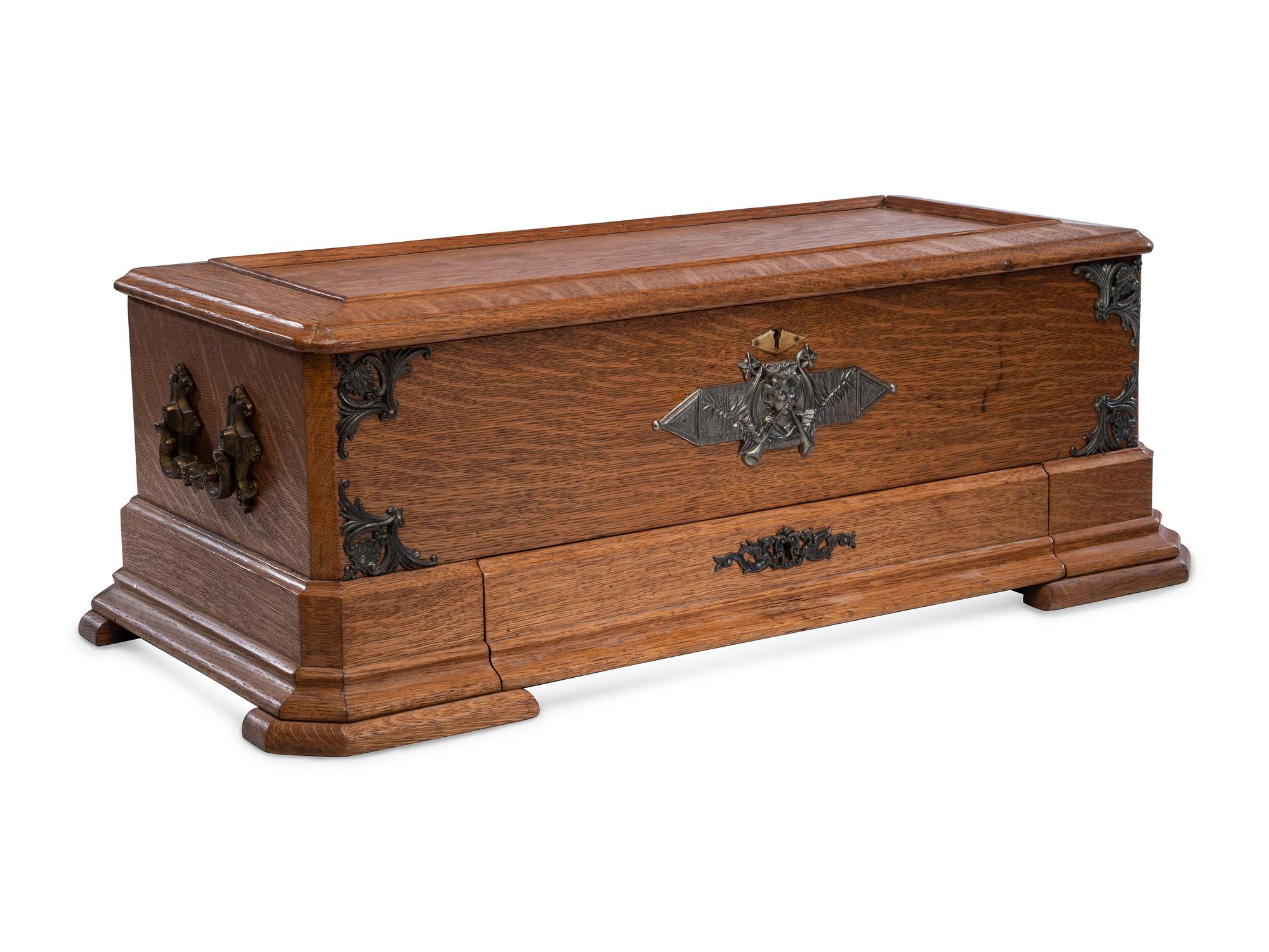 A Swiss Three-Cylinder Oak Music Box