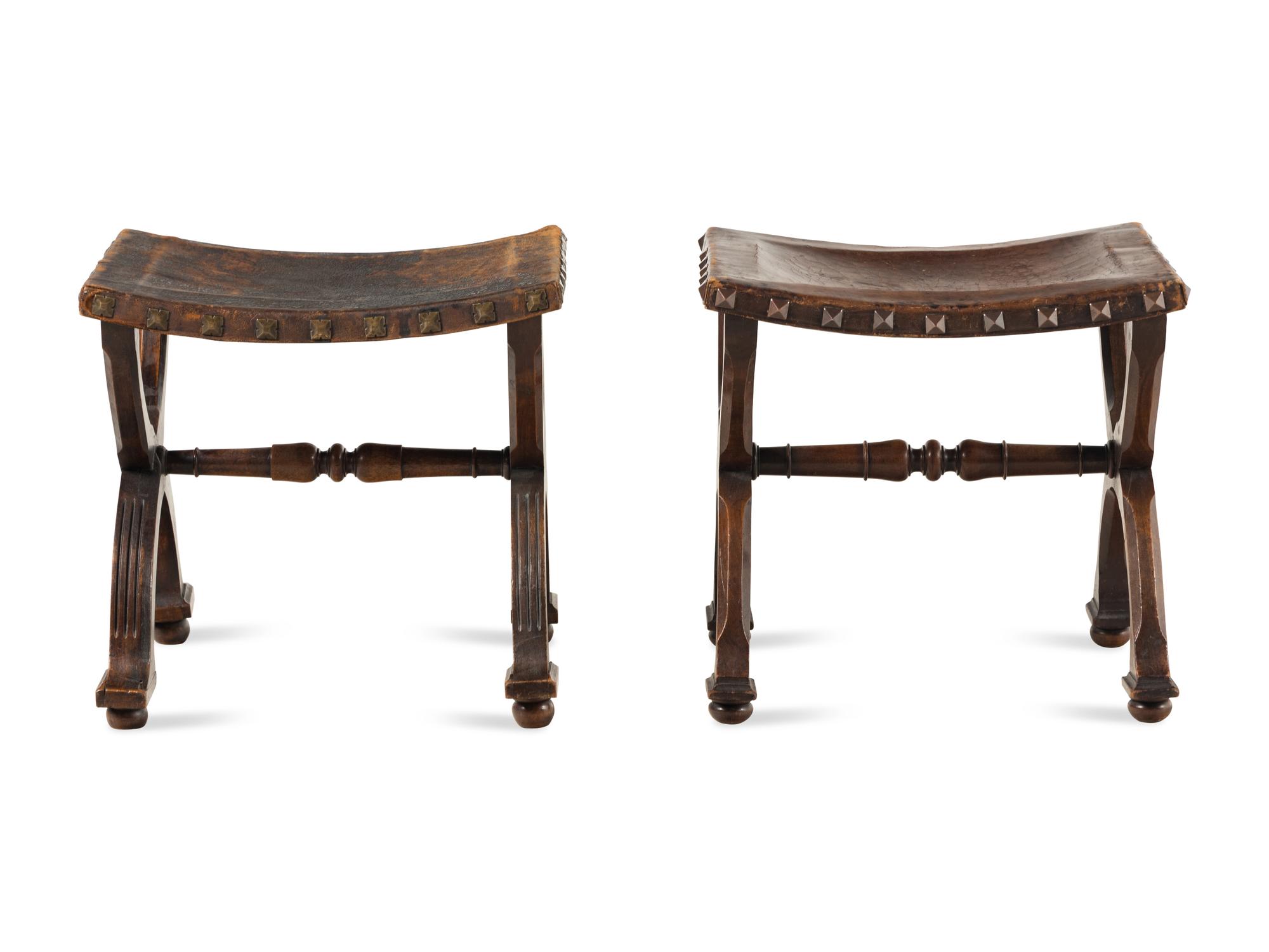 A Pair of Spanish Leather Stools