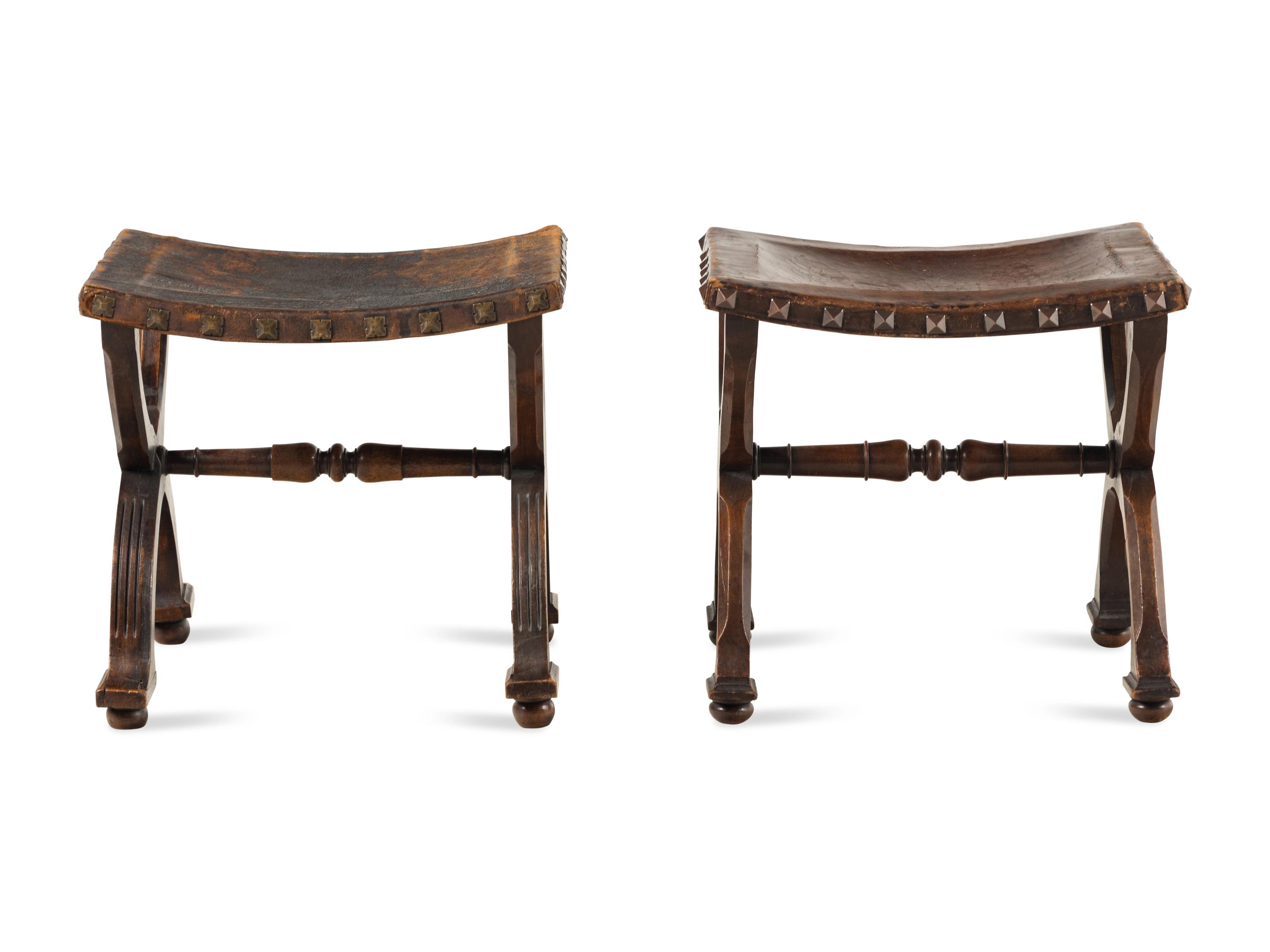 A Pair of Spanish Leather Stools