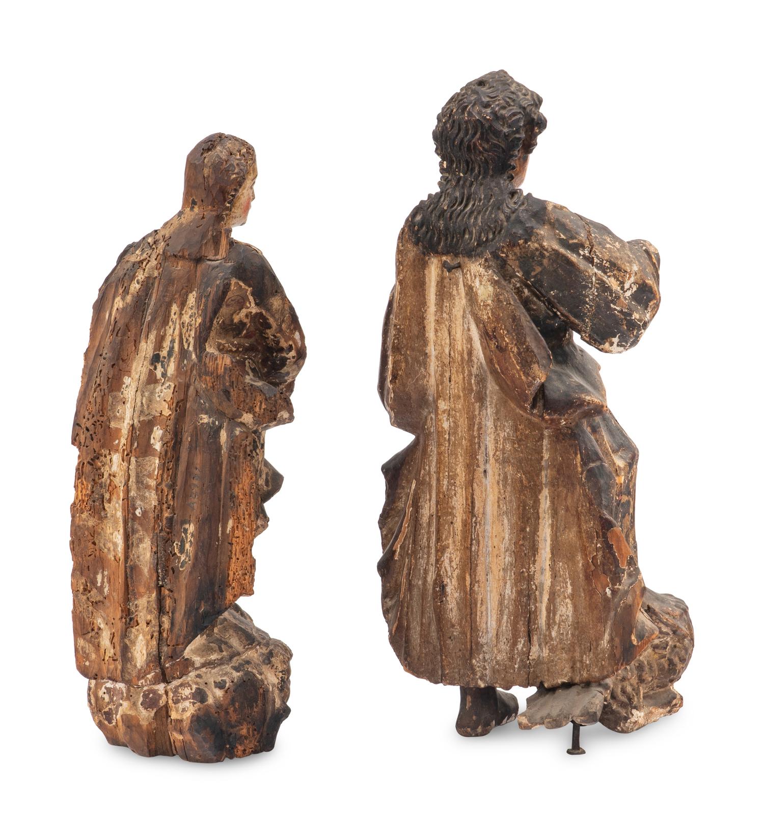 A Pair of Continental Carved and Polychrome Decorated Santo Figures