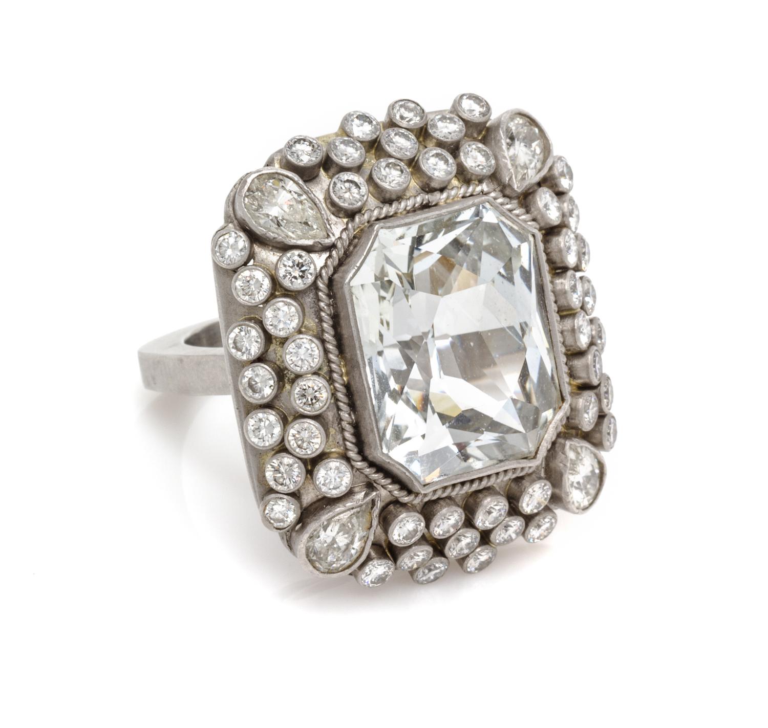 A Platinum, White Sapphire and Diamond Ring, 18.00 dwts.