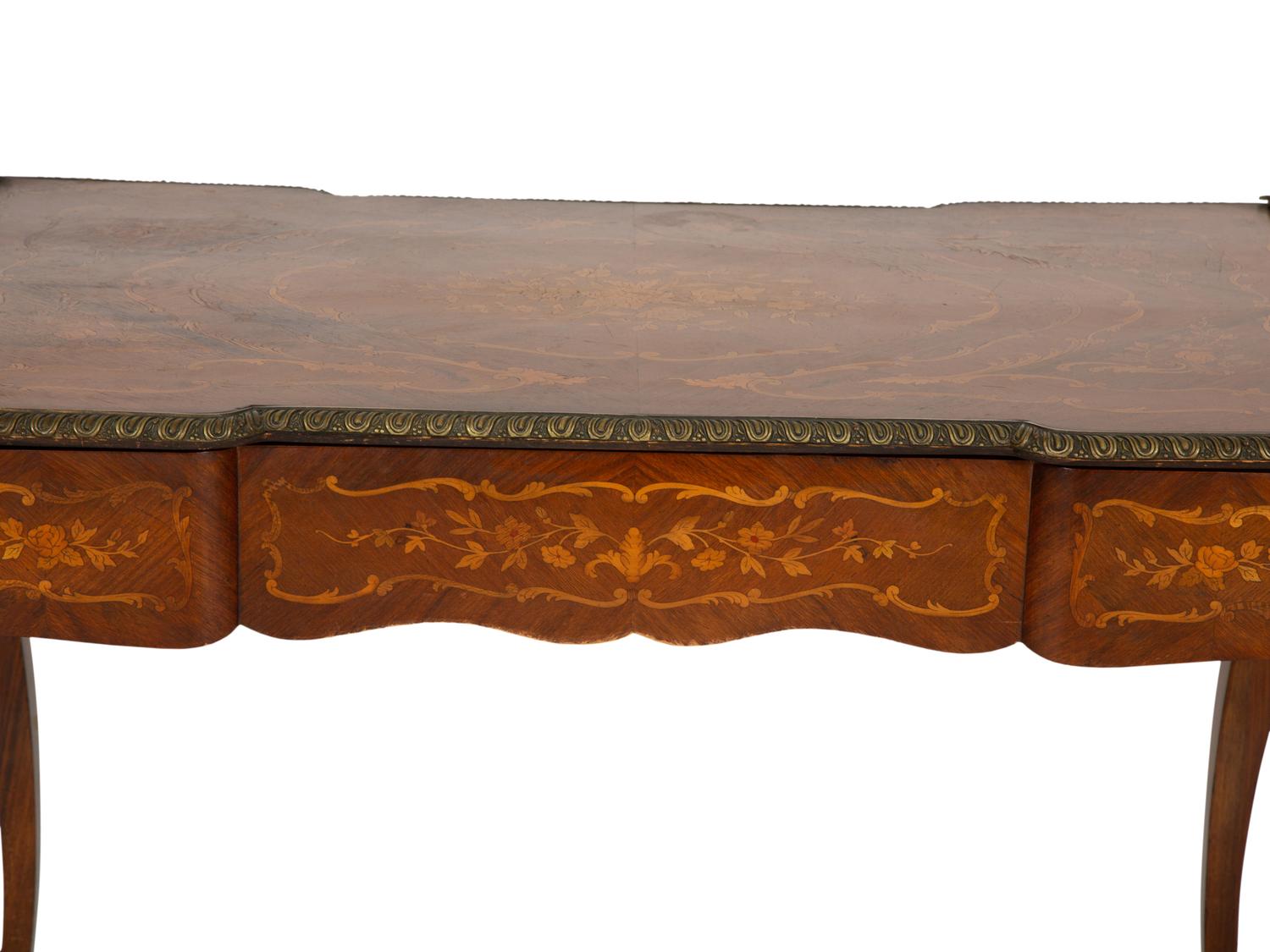 A Louis XV Style Brass Mounted Marquetry Writing Desk